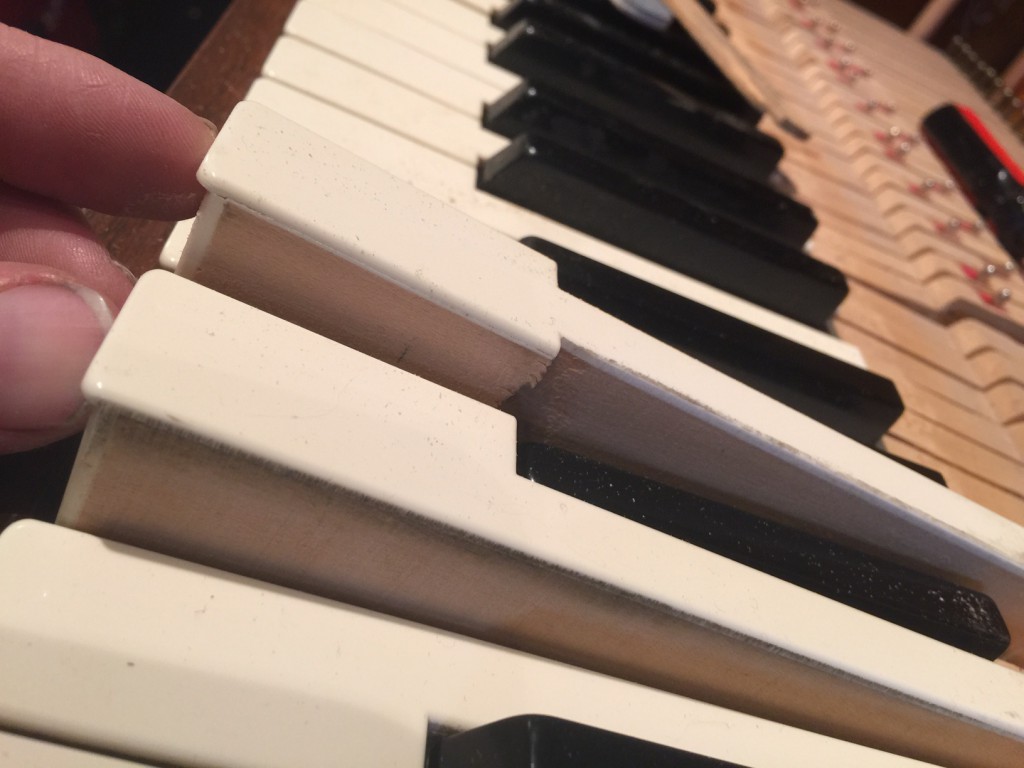 sanding piano keys